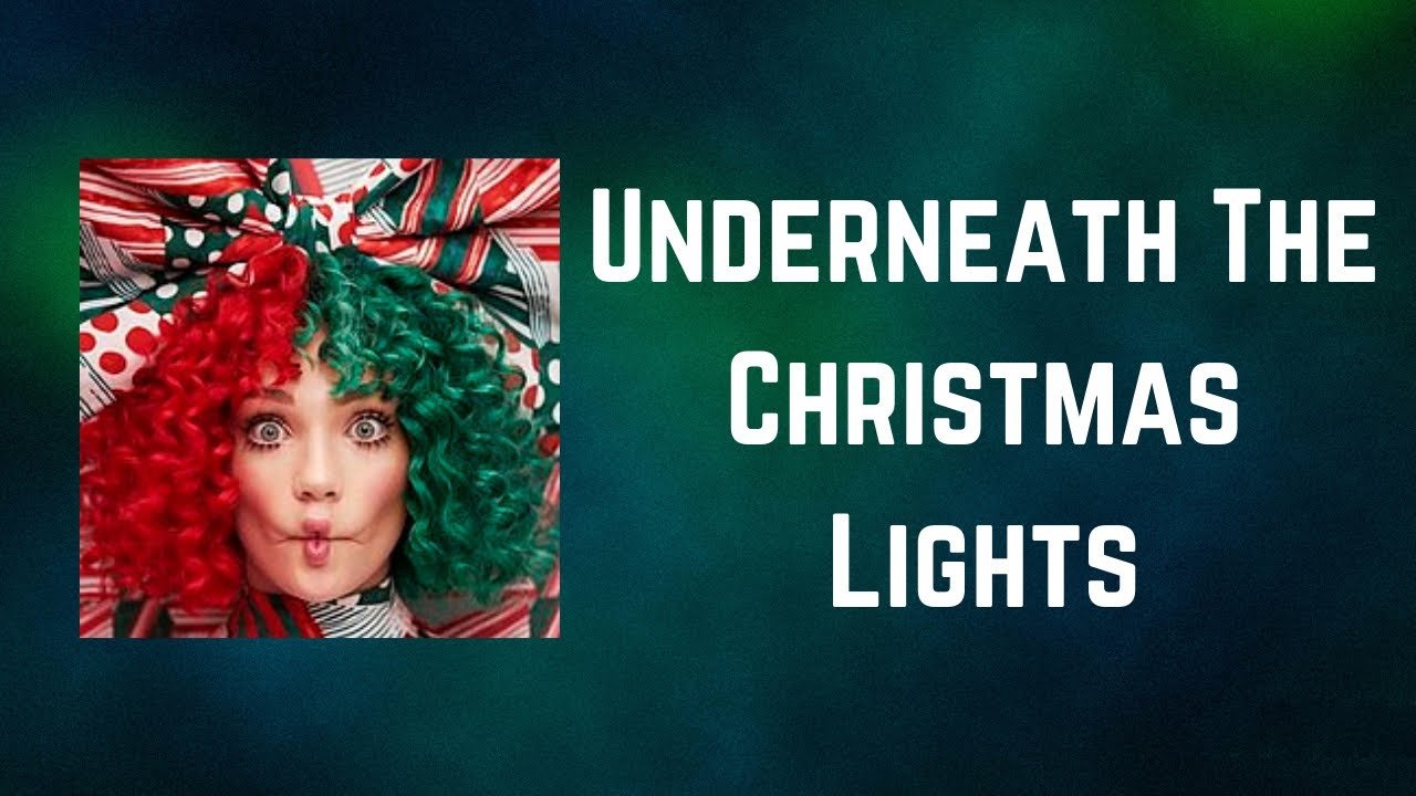 UNDERNEATH THE CHRISTMAS LIGHTS LYRICS (EN ESPAÑOL) - Sia